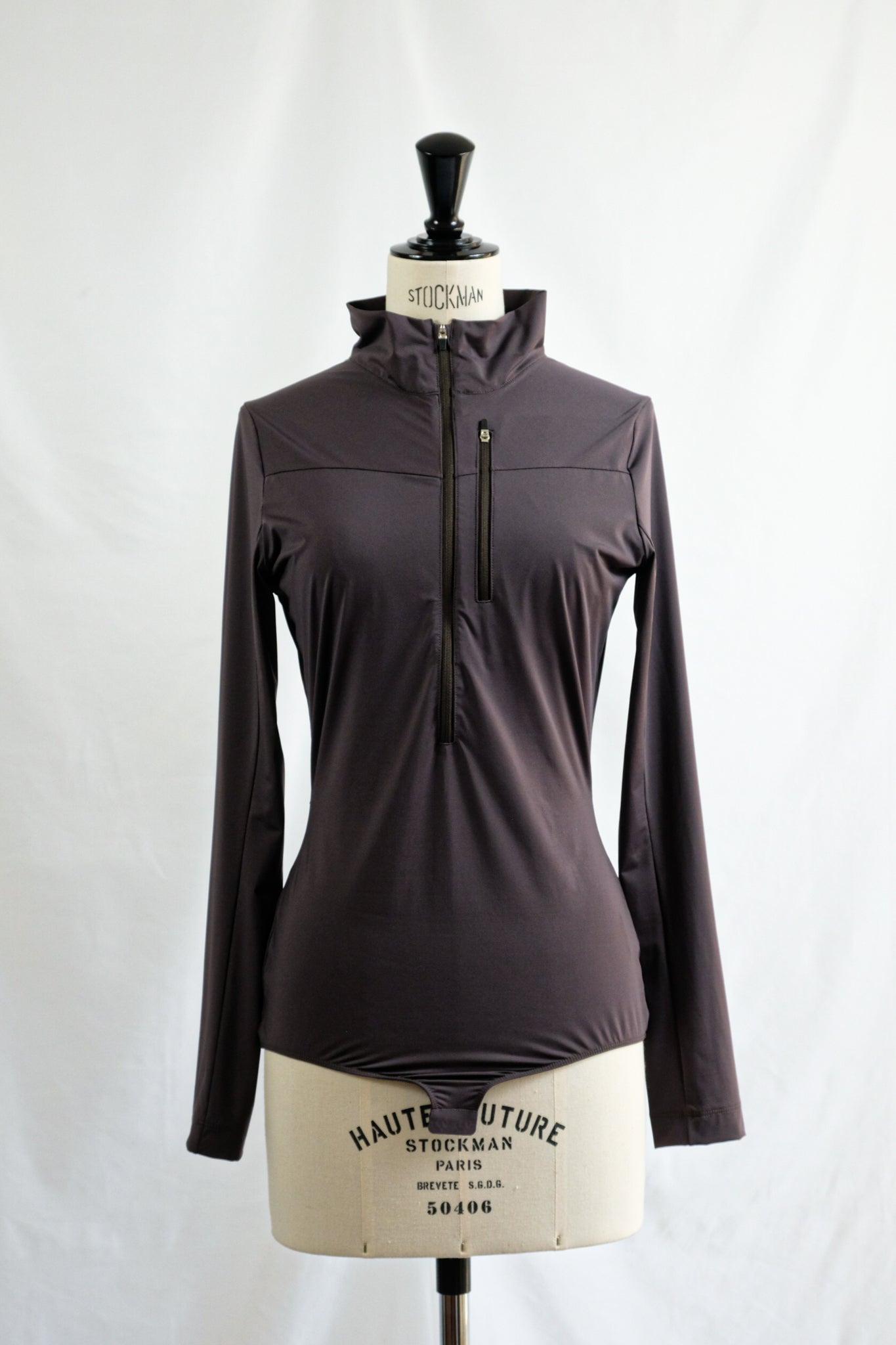 FUMIKA_UCHIDA "NYLON JERSEY HALF ZIP BODYSUIT / TAUPE"