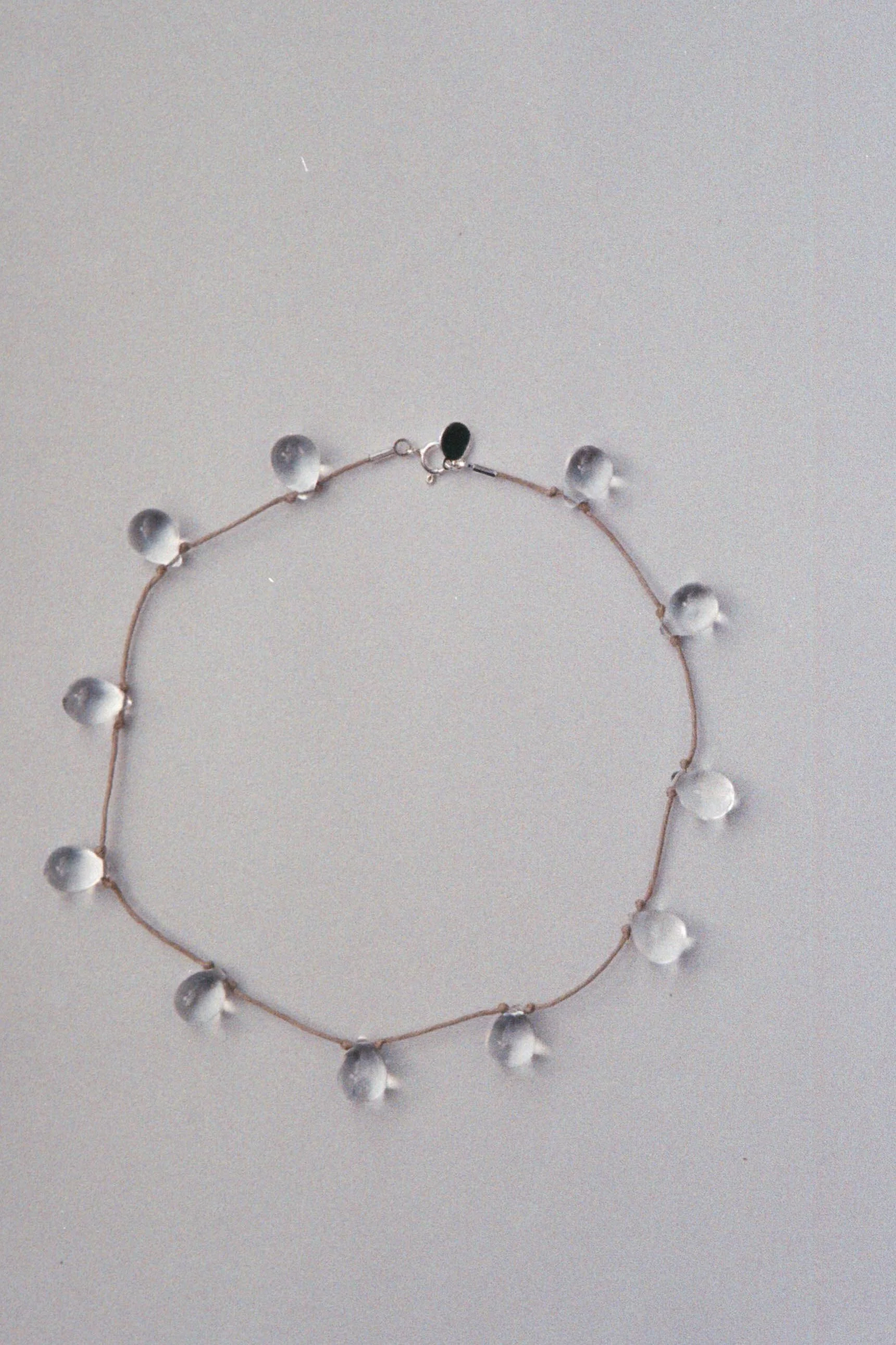 Sisi Joia "NOUE NECKLACE / CLEAR / TAN CORD"
